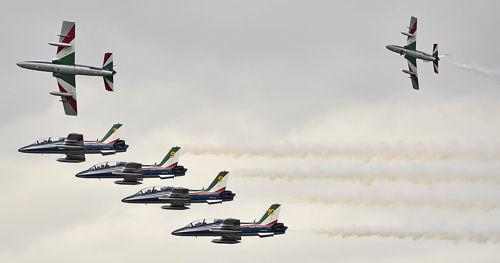 Frecce Tricolori demonstration team of the Italian Air Force at an air show in their Aermacchi MB-339 aircraft Frecce Tricolori demonstration team of the Italian Air Force at an air show in their Aermacchi MB-339 aircraft